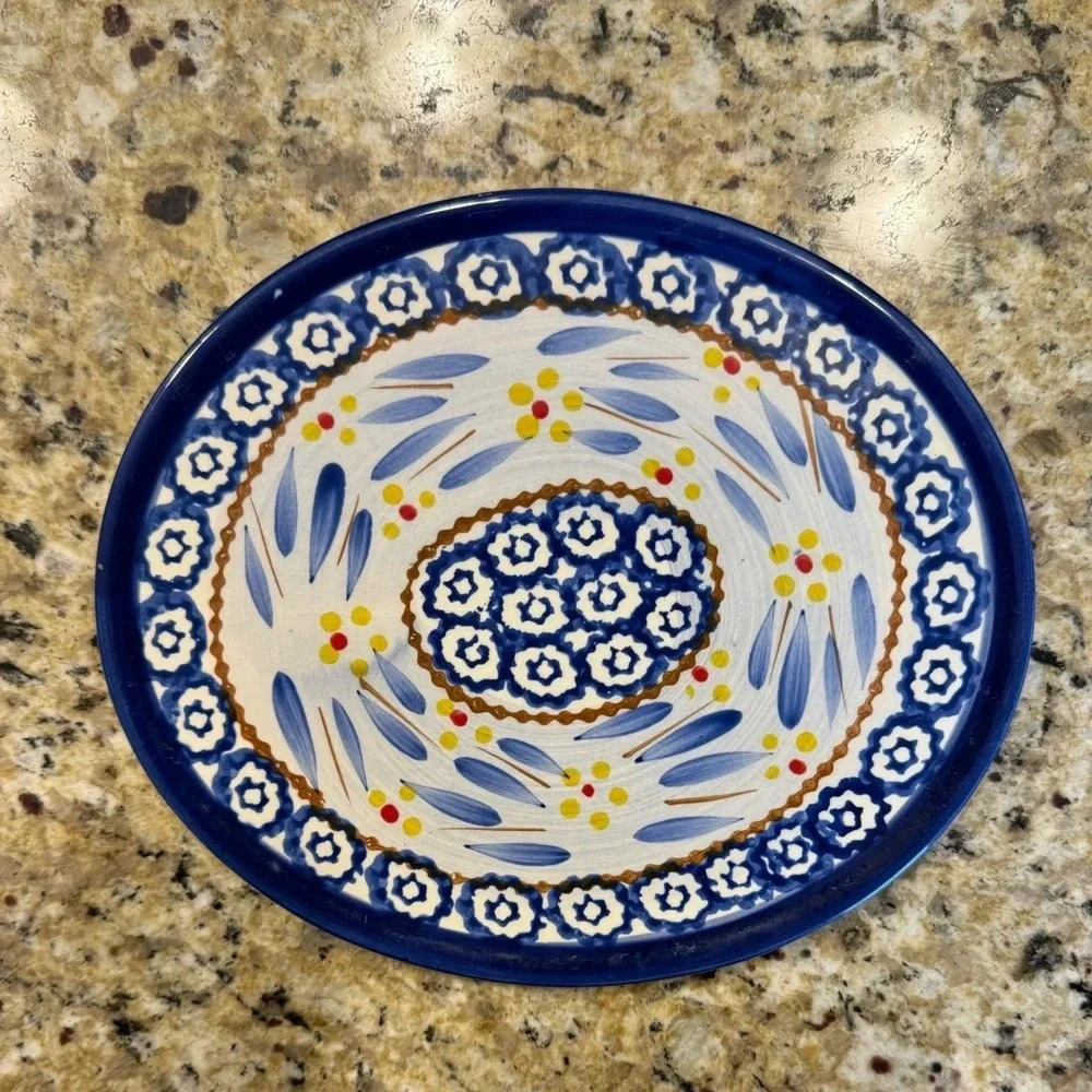 temptations bakeware old world 9 inch Trivet round blue